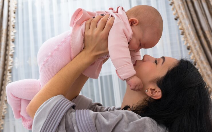 loving-mother-playing-with-her-little-baby