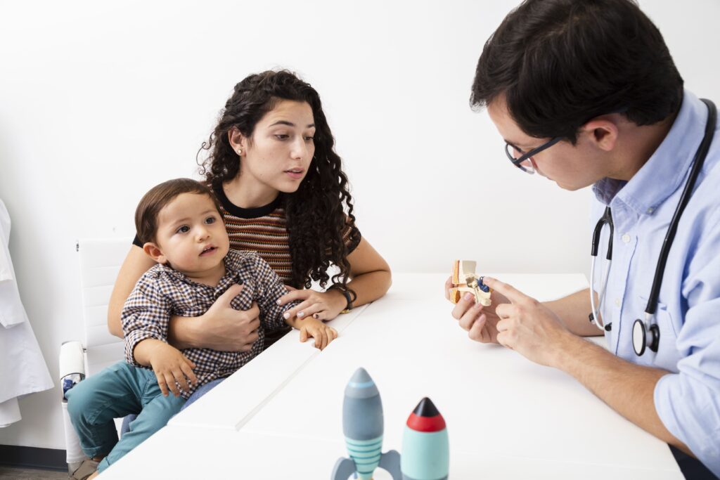 side-view-doctor-explaining-mother